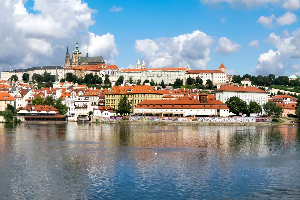 Prague Castle with St Vitus Cathedral above the Vltava in daylight